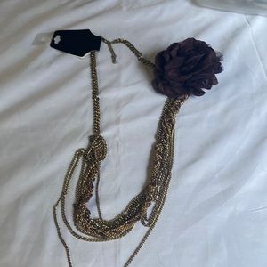 Necklace with multi chains and fabric flower